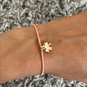 Hand made bracelet with salmon colour beads